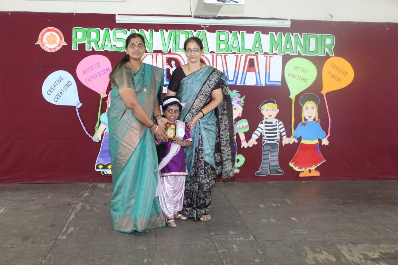 Happy child holds a trophy, celebrating a special winning moment. (1)