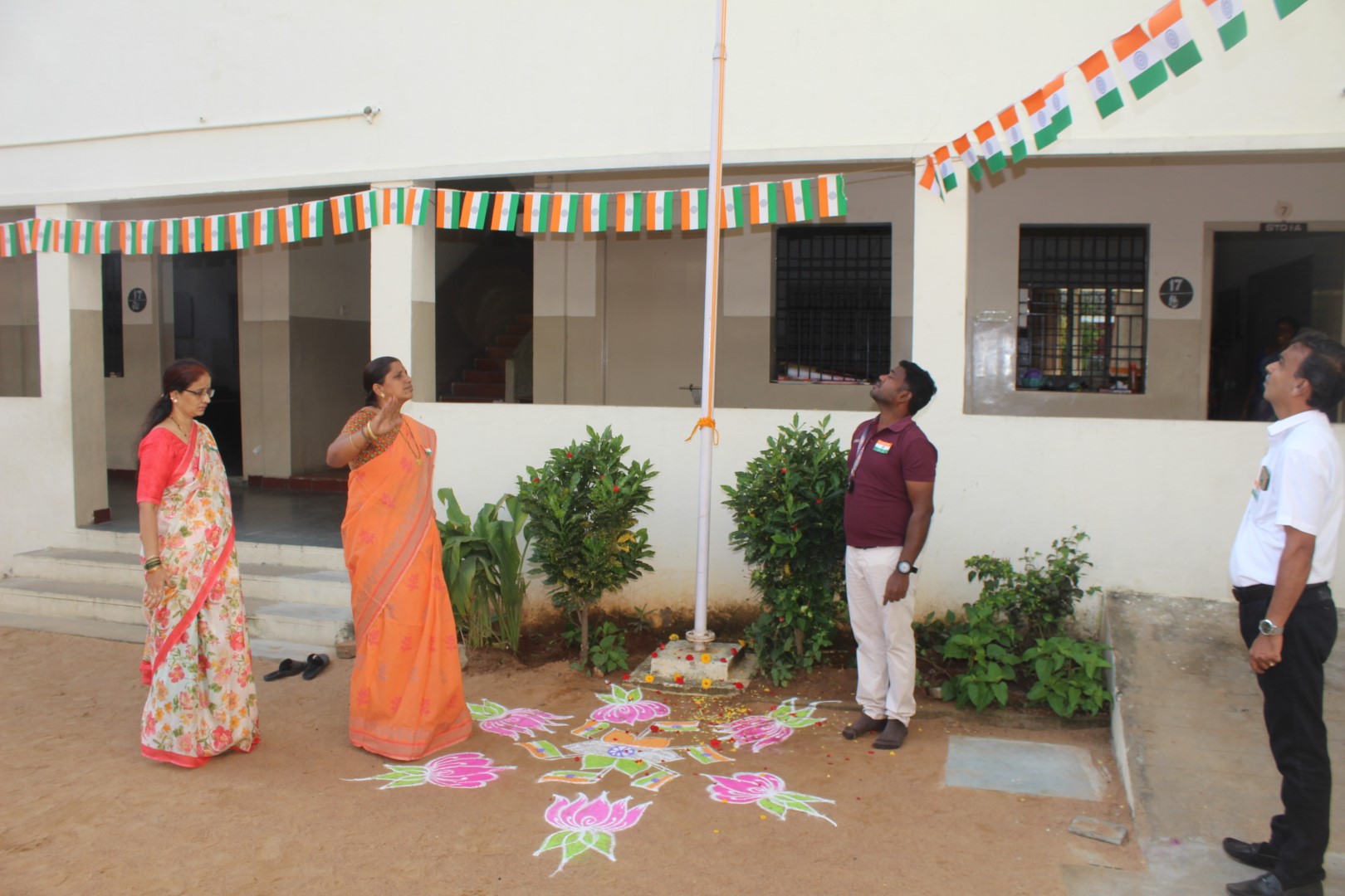 With pride and honor, our leader raises the tricolor high-celebrating the spirit of democracy and unity